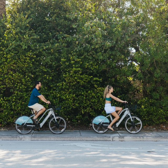 couple riding bikes in florida