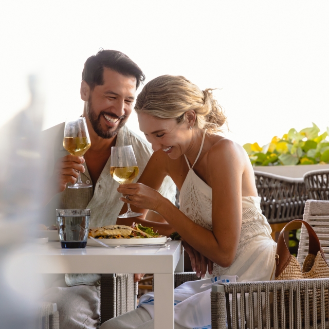 couple enjoying al fresco dinner at caretta caretta on singer island