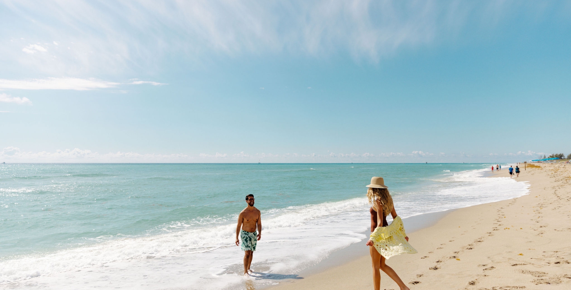 couple playing on the beach