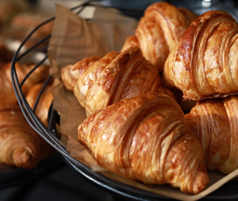 Image of a croissant at a restaurant in The Singer Oceanfront Resort