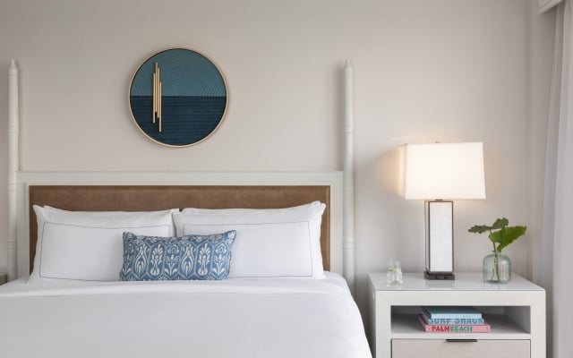 Guest room with premium amenities at The Singer Oceanfront Resort