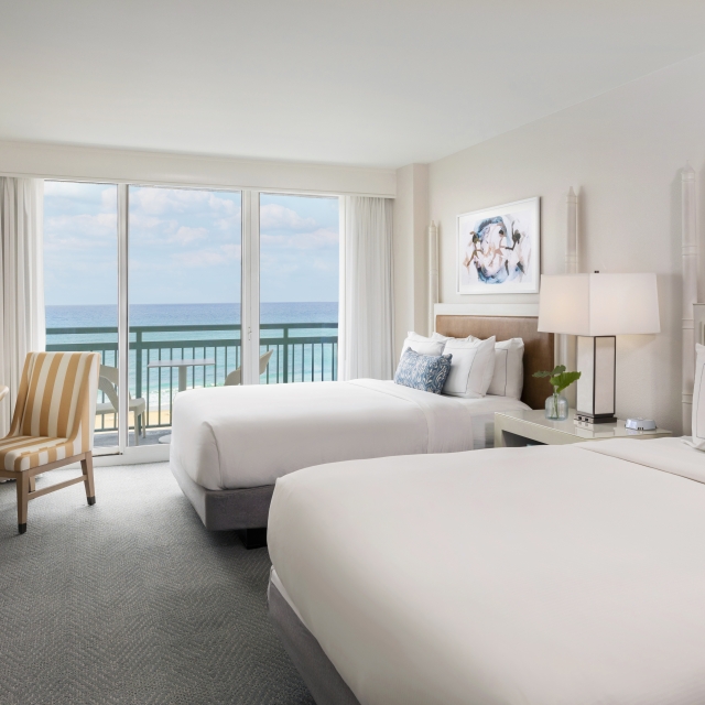 Elegant room with premium amenities in The Singer Oceanfront Resort