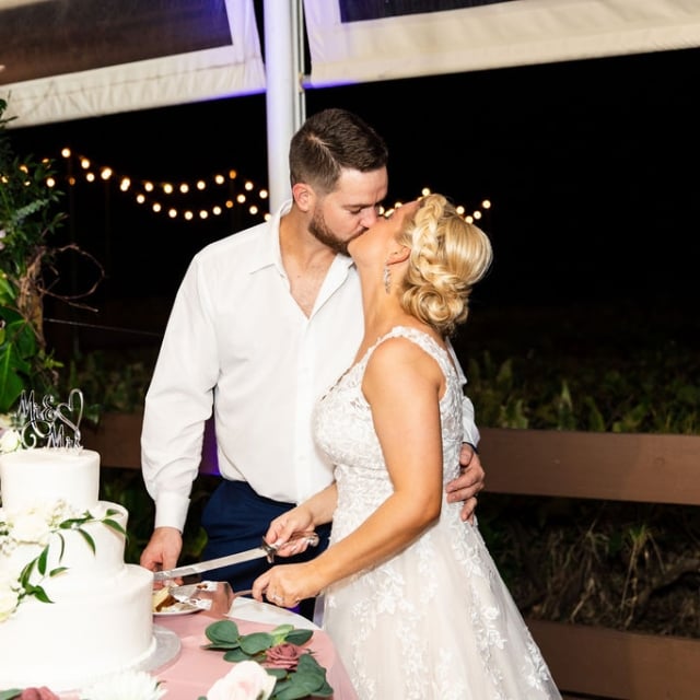 A couple at their wedding celebration in The Singer Oceanfront Resort