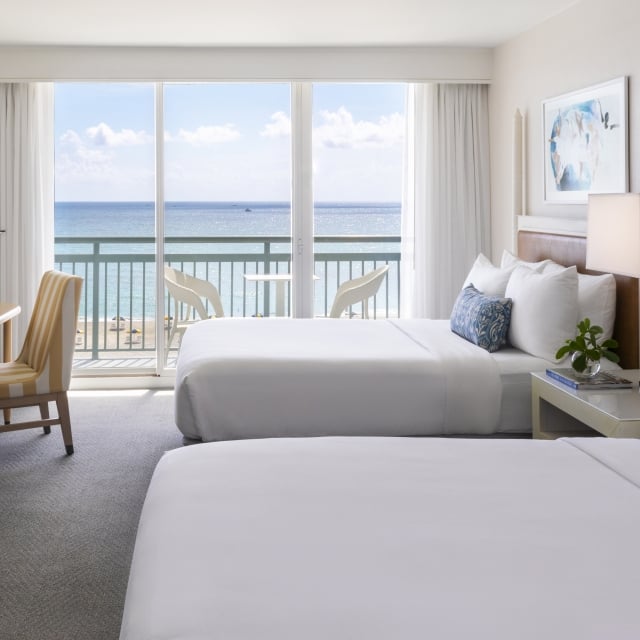double queen oceanfront guestroom at the singer oceanfront resort